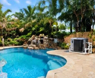 Pool heating equipment beside a swimming pool