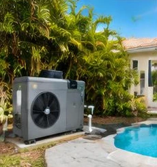 Heat pump pool heater hidden in a fenced side yard between a stucco wall and wooden fence