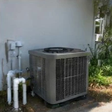 Heat pump pool heater hidden in a fenced side yard between a stucco wall and wooden fence