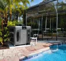 Pool heat pump installed beside a South Florida home — Pool heating for hotels & resorts