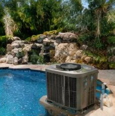 Pool heat pump installed beside a South Florida home — Pool Heater Maintenance in Delray Beach