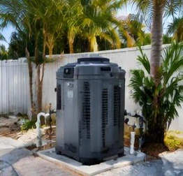 Pool heat pump installed beside a South Florida home — Commercial Pool Heaters in Wellington