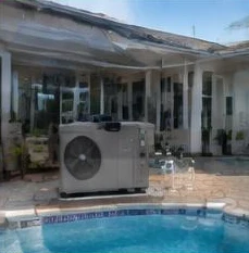 Pool heat pump installed beside a South Florida home — Pool Heaters in North Palm Beach