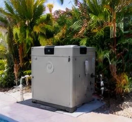 Heat pump pool heater hidden in a fenced side yard between a stucco wall and wooden fence