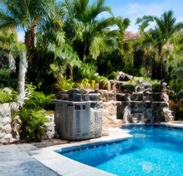 Heat pump pool heater hidden in a fenced side yard between a stucco wall and wooden fence