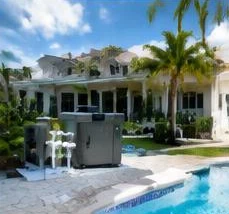 Heat pump pool heater hidden in a fenced side yard between a stucco wall and wooden fence